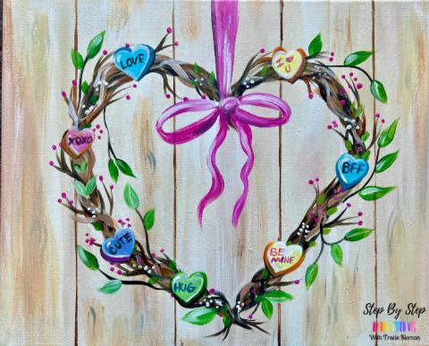 Wooden wreath in the shape of a heart painting
