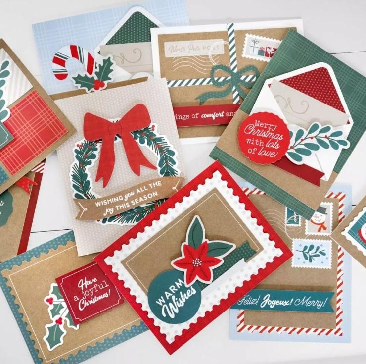 Picture with assorted Holiday cards scattered 