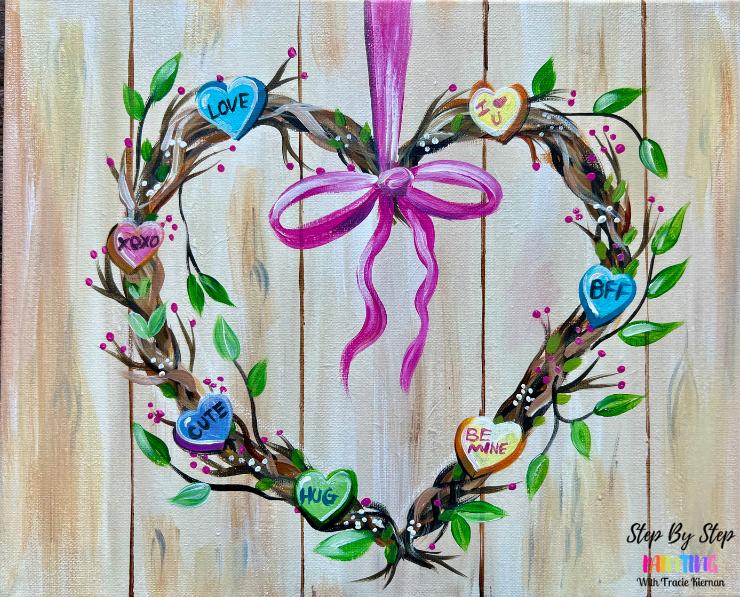 Wooden wreath in the shape of a heart painting